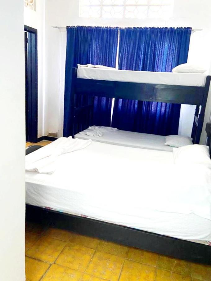 Hospedaje Carmelita โตไกมา ภายนอก รูปภาพ